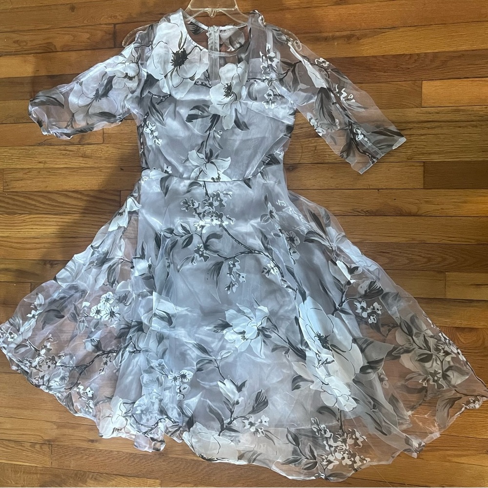 Floral print with sheer overlay